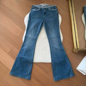 Low rise flare jeans with Y2K raw hem from Pacsun, size 27